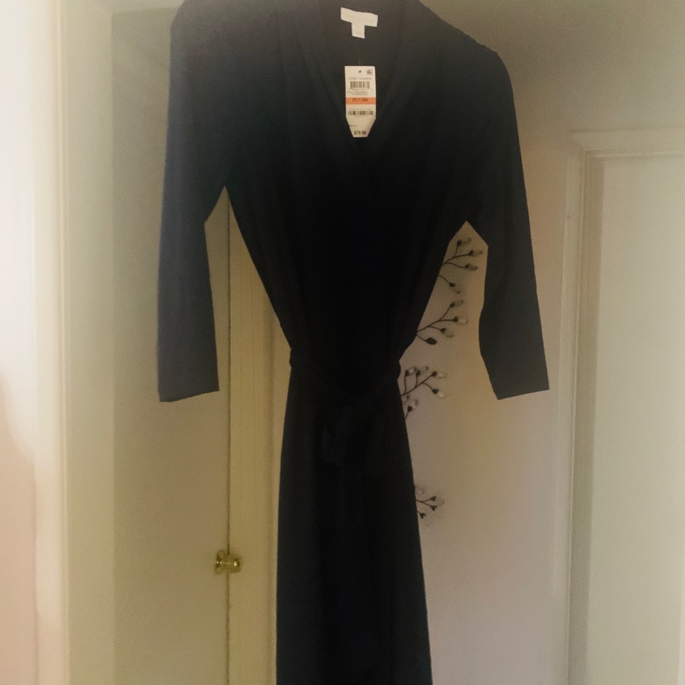 Navy blue “fit n flair” dress. 95% poly 5% spandex